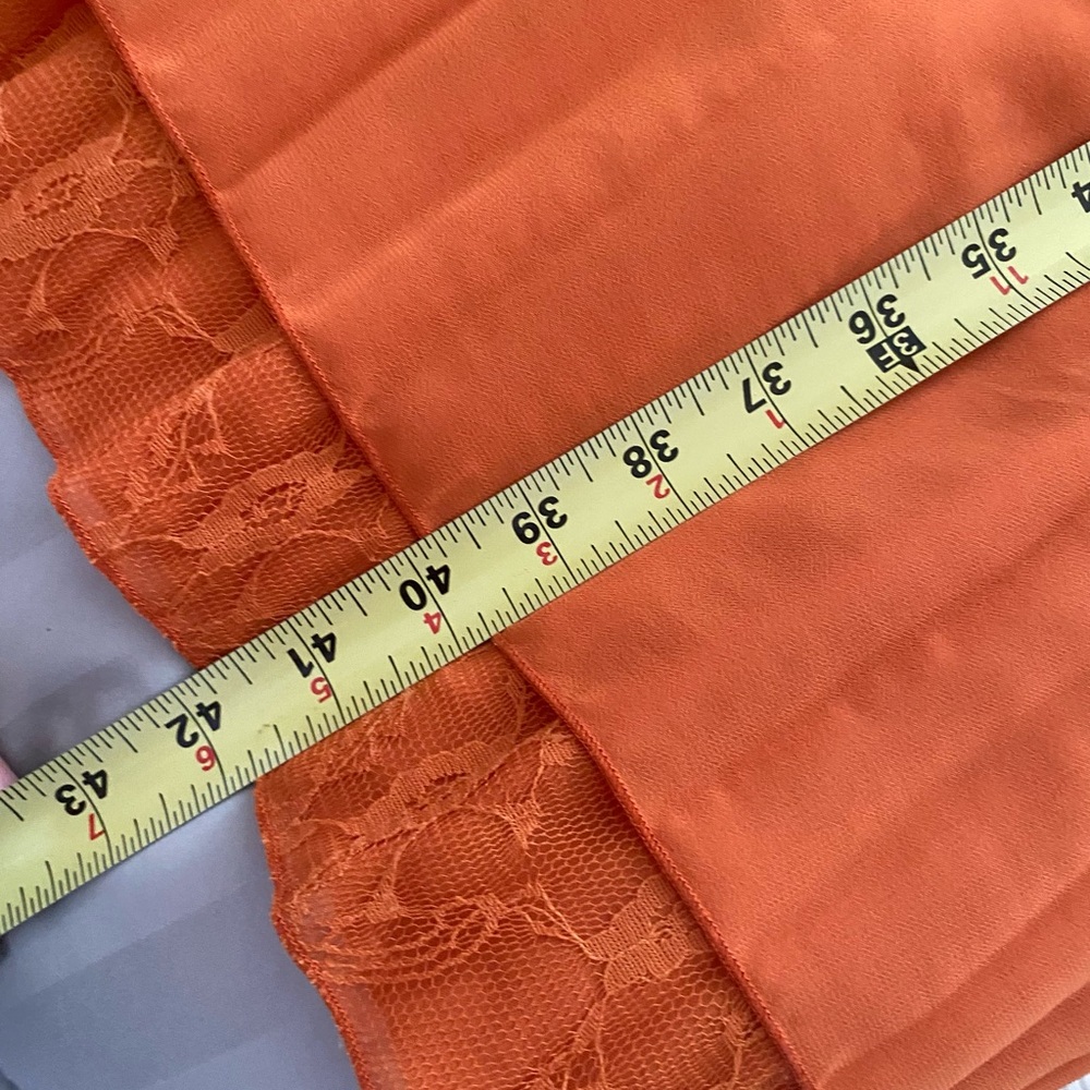 Fun year round dress.  Rust colored 100% polyester - Picture 4 of 6